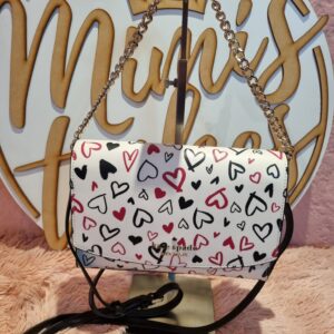Kate Spade, cross corazones