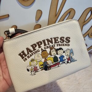 Coach Wristlet Snoopy blanca