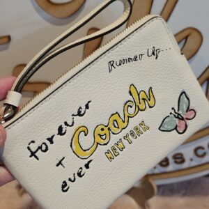 Coach Wristlet mariposa